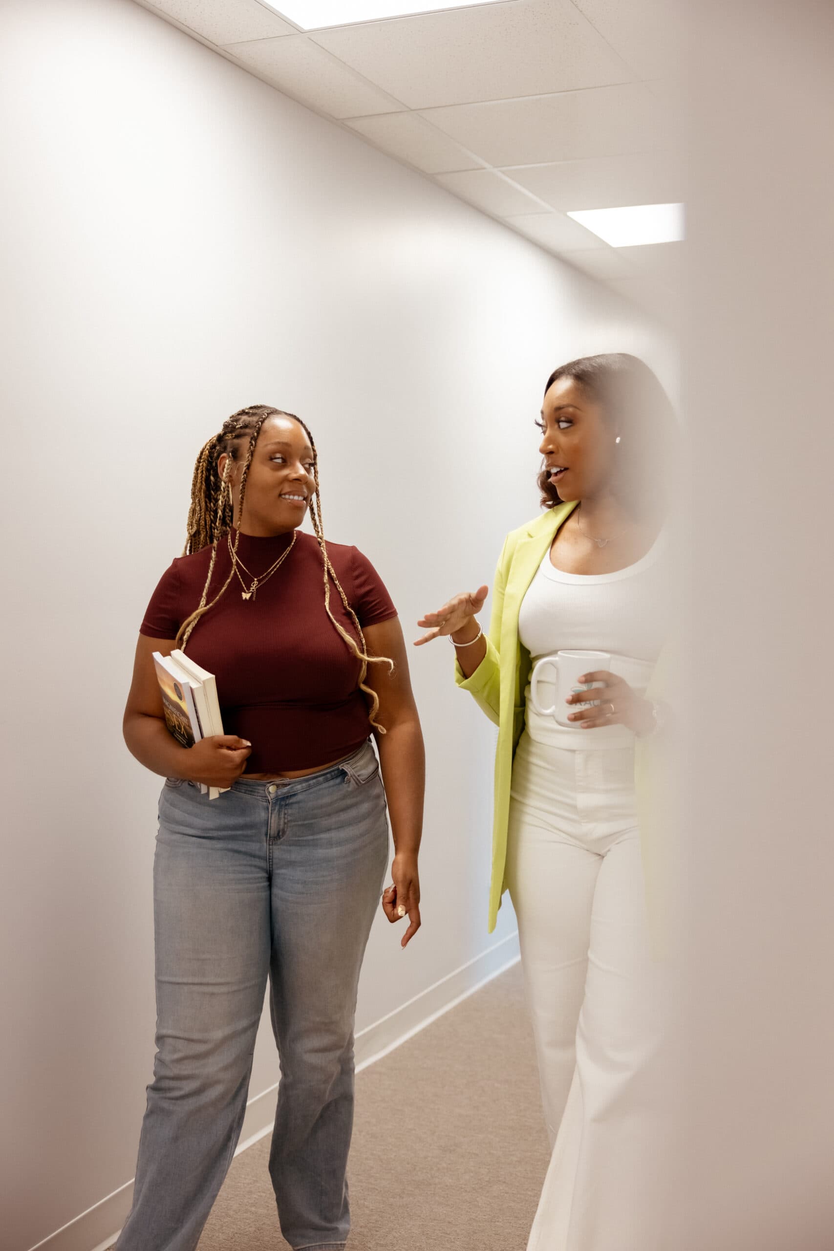 Grace Therapy and Wellness Center staff talking in the office hallway
