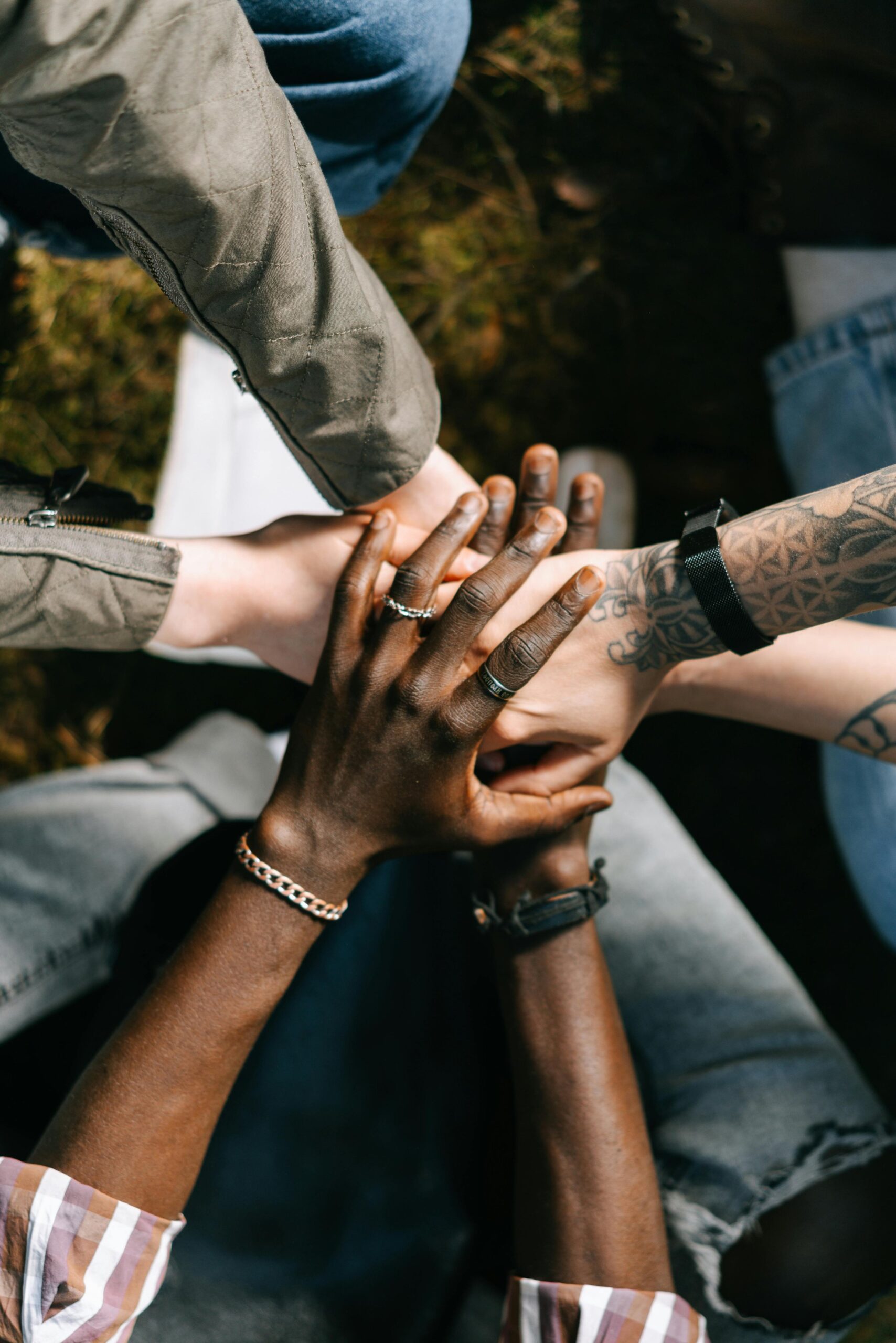 group of hands together - GTWC ask your therapist polyamory blog post