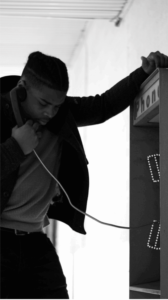 GTWC 988 at a glance - man on phone black and white 