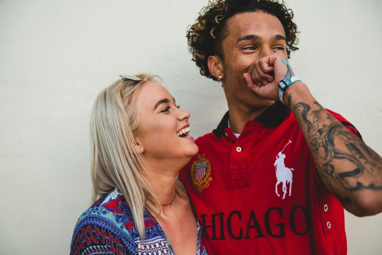 woman looking at man laughing - neurodiversity in relationships