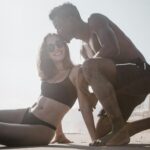 couple together on beach - sweat together connect deeper GTWC blog post