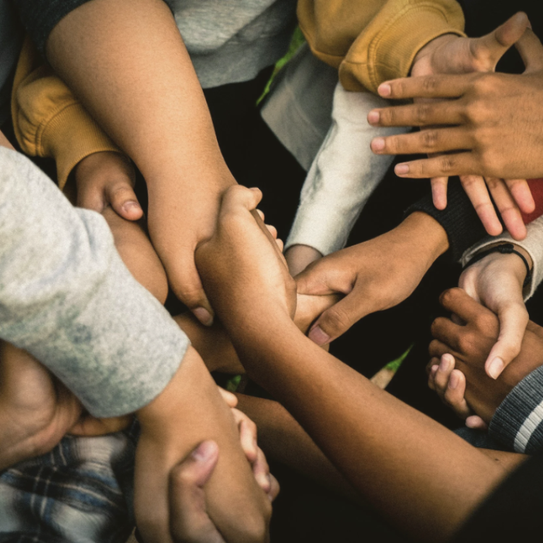 group of intersecting hands - GTWC intersectionality blog image